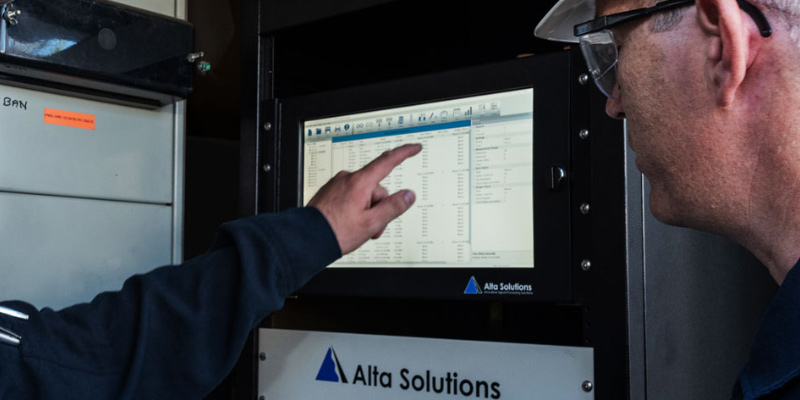 Alta Solutions Employees with Installed AS-7000 Machinery Protection System